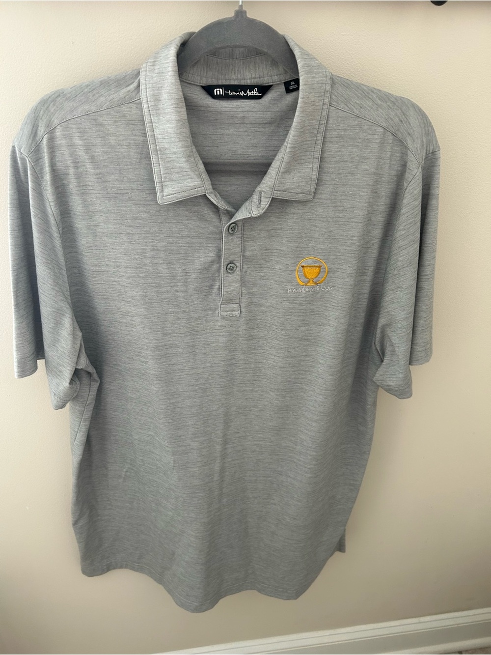 Travis Mathew Men's Gray Polo Shirt with President’s Cup Embroidered Logo. XL